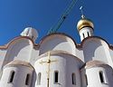 St. Mary Magdalene Church under construction in Madrid has its cupola and cross blessed