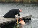 300 Russian servicemen receive Baptism in the field