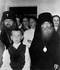 St. John, soon after his arrival in San Francisco, with Archbishop Tikhon (Troitsky). The author is at left in front of St. John. 