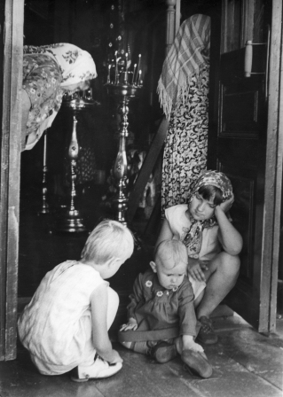 Children on the doorstep of a church, the seventies.