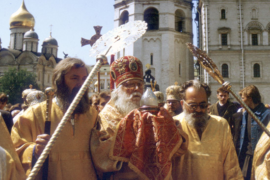 Bishop Basil (Rodzianko) carrying the Holy Fire in procession on the feast of Sts. Kirill and Methodiusssss.