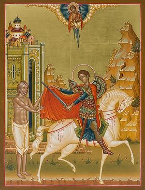 St. Martin of Tours cutting his cloak to clothe the poor man.