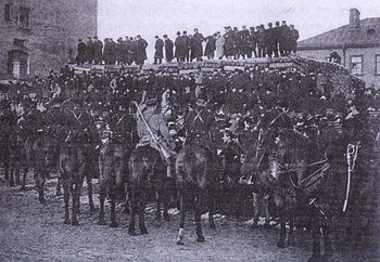 Загрузить увеличенное изображение. 1223 x 845 px. Размер файла 234877 b.
 January 9, 1905. A group of demonstrators blocked by the guard.