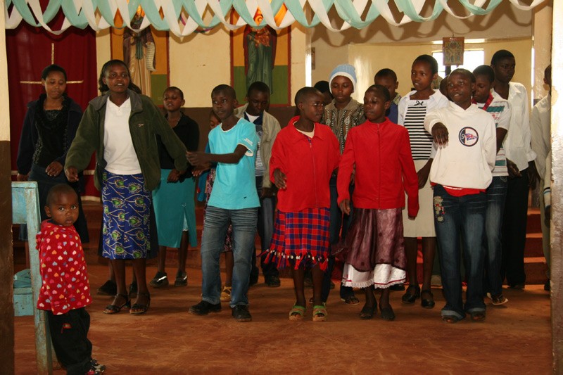 Hope for the Kikuyu.  Besides the traditional Church hymns, the people sing and dance to folk melodies and drums. This usually takes place after Liturgy, right in the church or churchyard.  Photo: Denis Makhanko 