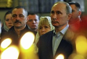 Премьер-министр России Владимир Путин на рождественском богослужении в Спасо-Преображенском соборе Петербурга. Фото: РИА Новости, Алексей Никольский