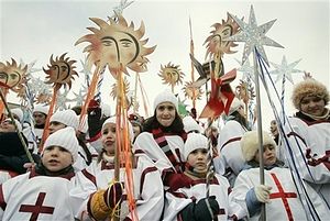 Загрузить увеличенное изображение. 409 x 274 px. Размер файла 108025 b.
 Children in the Alilo procession, Tbilisi, dressed in white.