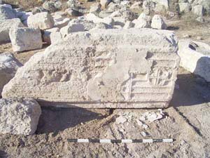 A stone pillar decorated with a cross (A. Ganor et al / the Israel Antiquities Authority) 