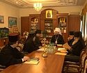 The members of the Holy Synod of the Orthodox Church of Moldova in a meeting with government officials