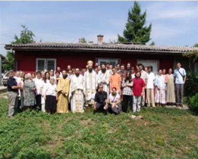 Archbishop Jovan with the faithful in front of the St. Nectarios Chapel in Skopje.