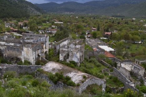 Abandoned homes of former Greek Orthodox residents of Kayaköy mingle with newer homes of Turkish residents, reflecting the tortured history of the area.