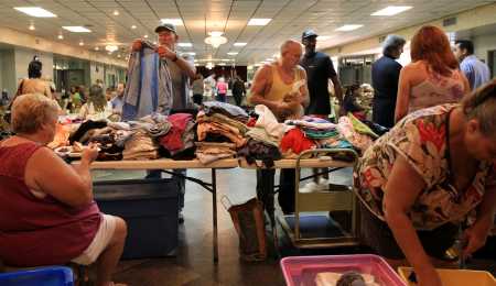 Free clothing is given away on the third Monday of each month in Father Tryfon Hall at St. Nicholas Greek Orthodox Cathedral in Tarpon Springs. The health fair also features free haircuts, blood pressure screenings, and other services.