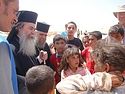 Patriarch Theophilos III of Jerusalem visits Al-Zaitari refugee camp in Jordan