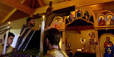 Mike Levy, The Plain DealerFather Michael Butler, shown inside St. Innocent Orthodox Church in 2002, hopes the church will soon see its five brass bells again. The bells disappeared from the front of the church Sunday afternoon.