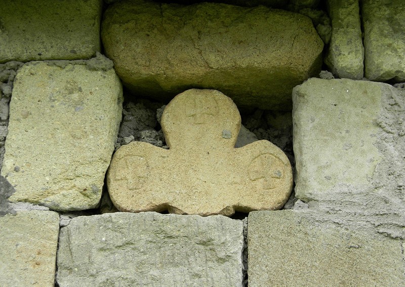 Часть старого креста в кладке