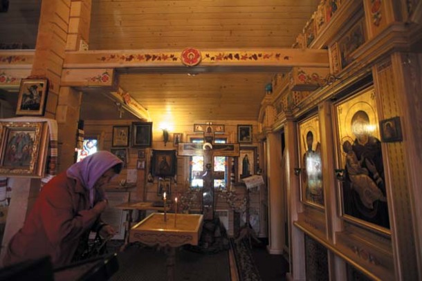 The woodenSaint Yuriy Orthodox Church near Mykhailivska Square is decorated with cheerful Petrykivka ornaments. 