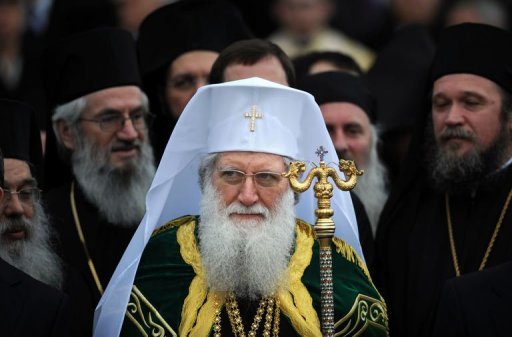 Newly elected, Bulgarian Orthodox Church Patriarch Neophyte stands among church bishops at the golden-domed "Alexander Nevski" cathedral in Sofia on February 24, 2013. Bulgaria's Orthodox Church on Sunday elected metropolitan Neophyte of the northern city of Ruse as its new leader after Patriarch Maxim died last November aged 98 after leading the church for over 40 years.