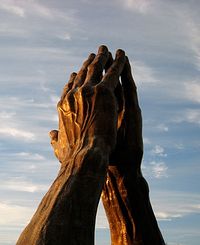 Praying hands statue in Tulsa, OK. Credit: Photo by C. Jill Reed, via Flickr, http://www.fotopedia.com/items/flickr-2221223106
