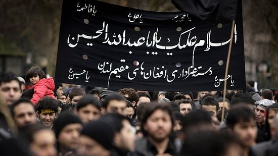 Shiite Muslims gather in Hyde Park in West London to mark the final day of Ashura. (AFP Photo/Shaun Curry)