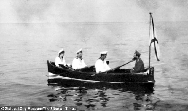 Tsar Nicholas II and Alexei on a boat in Finland.