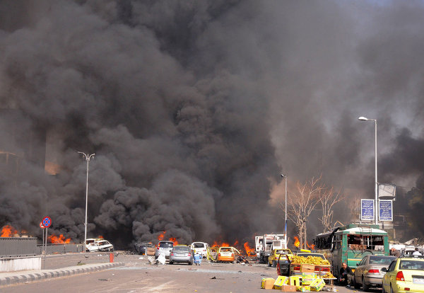 © AFP 2013/ HO/SANA. Пожар после взрыва в центре Дамаска