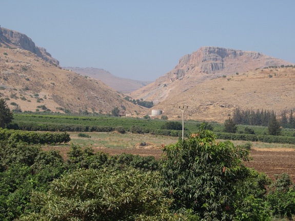 View looking southwest showing the mountains bounding the Ginosar Valley in Israel. Archaeologists found pottery remains, cubes known as tesserae and, in the modern town, architectural fragments indicating a town flourished in the area from the second or first century B.C. until after the fifth century A.D. Photo: Dr. Den Dark