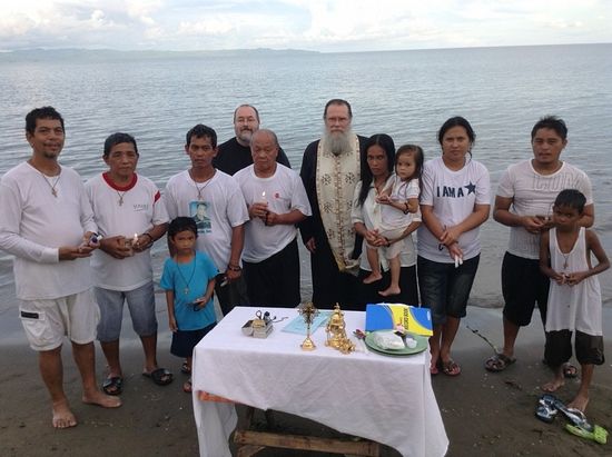 Orthodox community. New converts after their baptism in the ocean. August 2013.