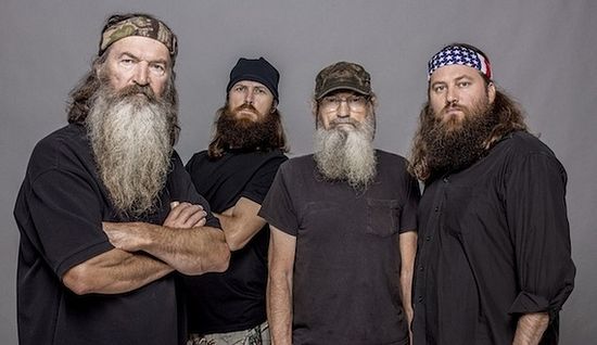 Phil Robertson (left) with the other Duck Dynasty stars, whose Christianity has been an open feature of the show. (AP/A&E/Zach Dilgard)