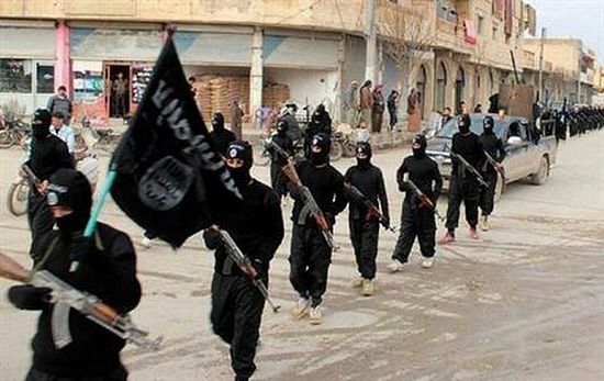 Militants march in Rakka. January 2014. AP Photo/militant website