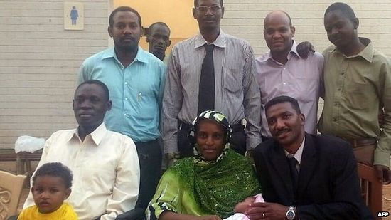 ​Meriam Ibrahim with her husband Daniel Wani (L), children and legal team after her release in Khartoum