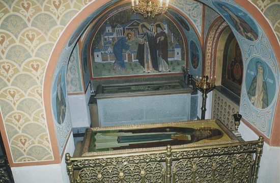 The archway with the granite reliquary containing the relics of Optina elders Sts. Lev and Macarius (front).