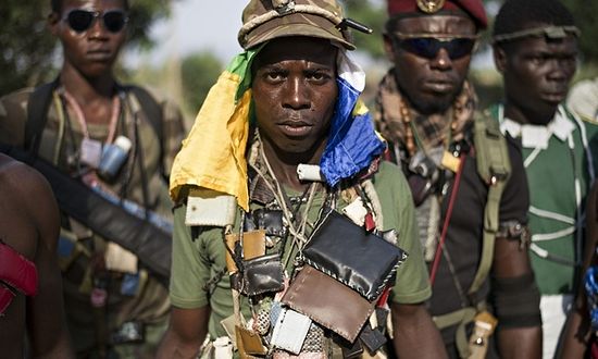 Anti-balaka militia in Bossemptele, Central African Republic, are slowly changing their attitude towards Muslims. Photograph: Fred Dufour/AFP/Getty Images