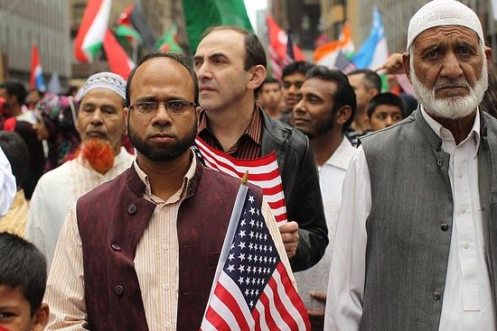 People march in the American Muslim Day Parade on September 26, 2010 in New York, New York.