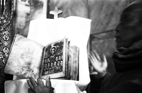 Jerusalem, December 2012. “In the Ethiopian church near Damascus Gate, the guardian shows an ancient version of the Bible. In the Christian community of Jerusalem between Damascus Gate and Jaffa Gate, the Catholic, Orthodox, Egyptians and Ethiopians are divided between small spaces and winding paths.”
