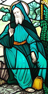 A stained glass image of St. Beuno.