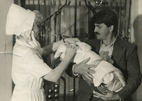 Иван Осяк с новорожденным