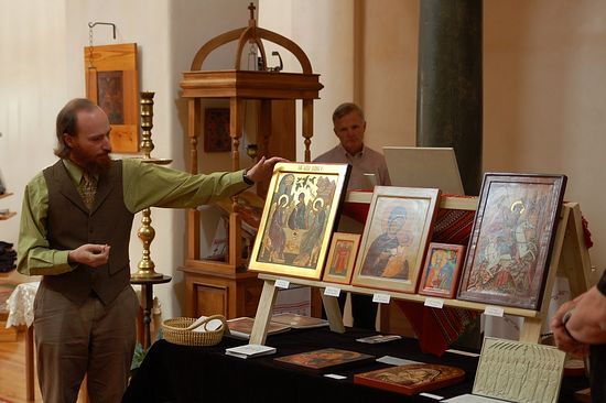 Andrew Gould explaining the exhibition of icons