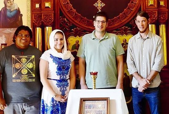 In the Warsaw Seminary chapel are [from left] Victor Lutes, Janine Alpaugh, John Shimchick, and Joseph Green.