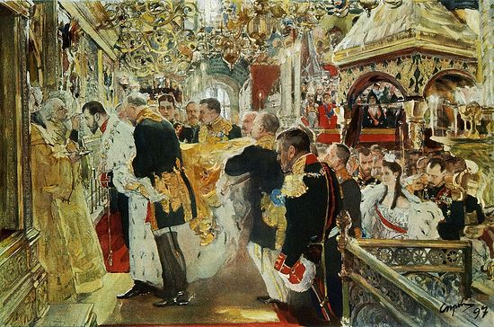 The anointing of Nicholas II, May 1896, Uspenskiy Sobor, with Empress Alexandra waiting behind him for her own anointing.