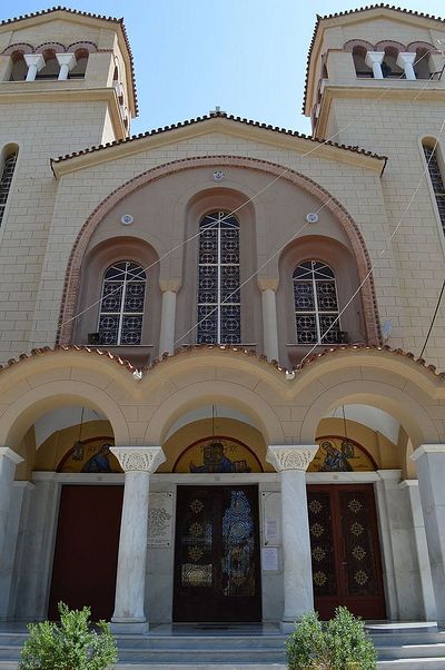 The facade of St. Efthimios in Keratsini; what looks like a normal, neighborhood church is bustling with a hive of do-gooders