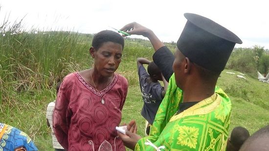 Tonsuring the newly baptized