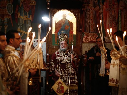 An Orthodox Christian bishop heads the celebration of Christmas at St. Porphyrius church in Gaza on Jan. 7, 2015.