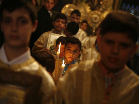 Palestinian Christians at the St. Porphyrius Church in Gaza City celebrate Palm Sunday June 4, 2015. (Photo: Ahmed Hjazy, Pacific Press/LightRocket via Getty Images)