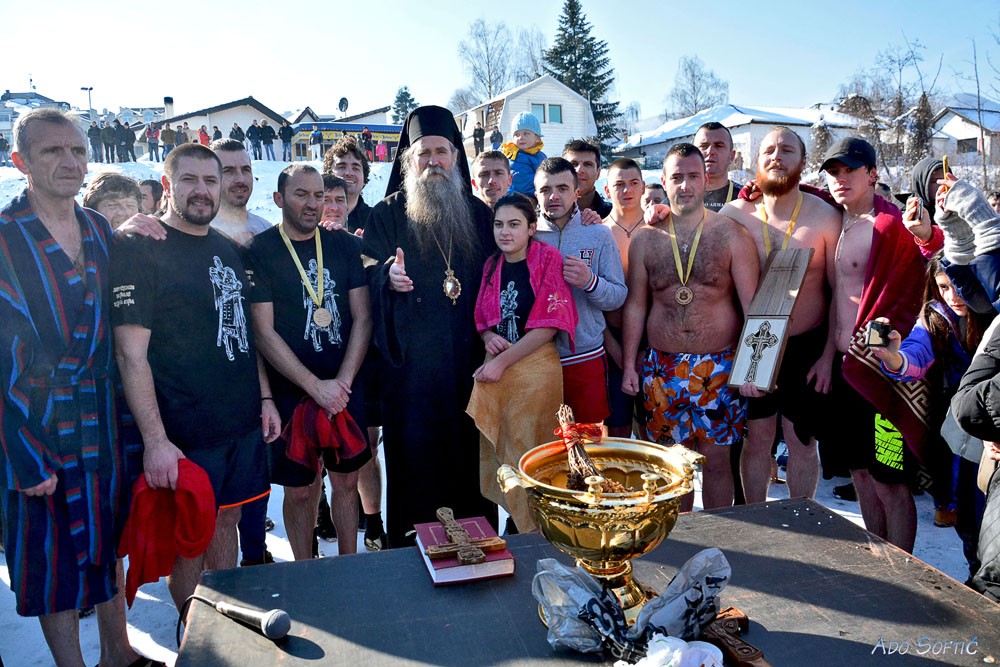 Bishop Joanikijie of Budimlje and Nikšić with the swimmers.