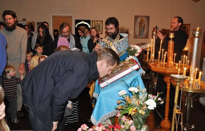 A worshiper kisses the Bible in reverence during a special service at the Holy Trinity Russian Orthodox Church in Mebane, N.C., on Feb. 26, 2016. Holy Trinity Russian Orthodox Church Contributed