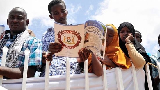 Photo Source: ABC News, The Associated Press; Photo: Kenyans take part in the memorial ceremony at Garissa University, Garissa, Kenya, Saturday, April 2, 2016.