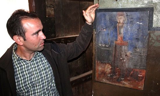 Ledenik Mayor Anton Krastev showing the newly found self-portrait of Zahari Zograf. Photo: Borba daily