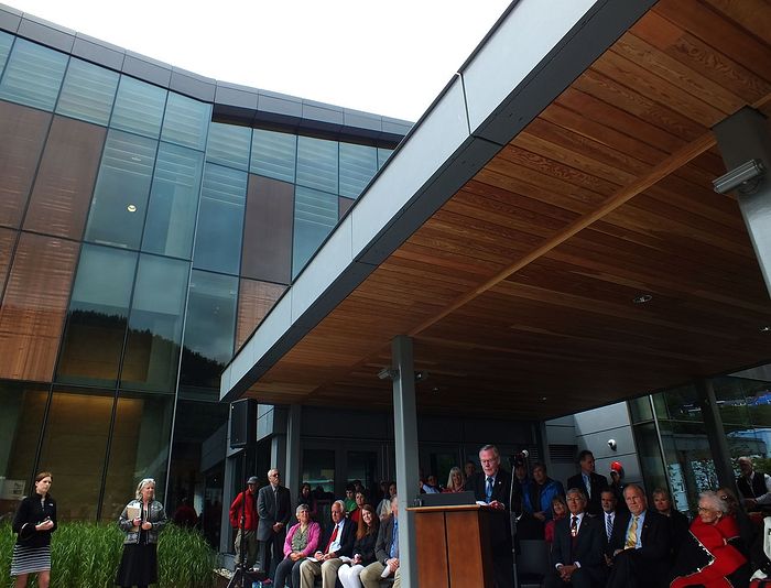 Juneau Sen. Dennis Egan addresses a crowd during the grand opening of the Father Andrew P. Kashevaroff Library, Archives and Museum on June 6, 2016. (Photo by Matt Miller/KTOO)