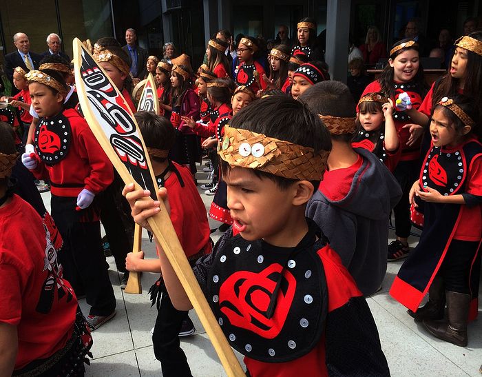 Juneau students in the Tlingit Culture, Language and Literacy program perform before the ribbon cutting of the Father Andrew P. Kashevaroff Library, Archives and Museum on June 6, 2016. (Photo by Matt Miller/KTOO)