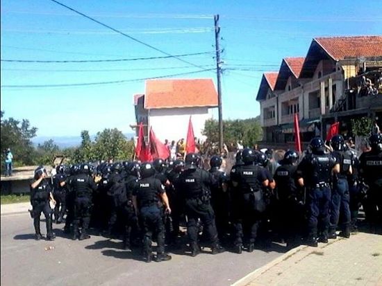 Police try to prevent violence at the protest in Mushtisht/Mustiste. Photo: BIRN
