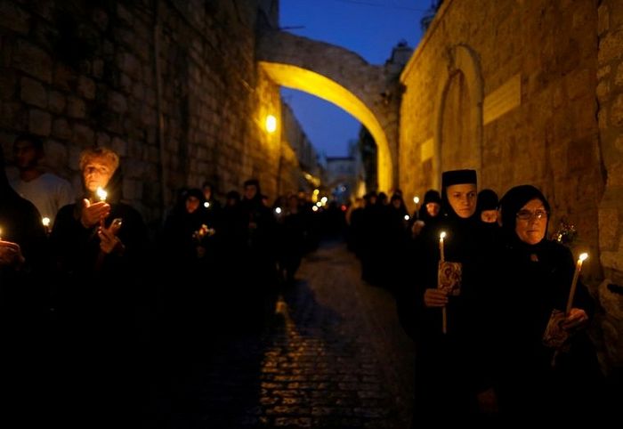 Reuters Orthodox Christian nuns take part in an annual procession at the end of August along the Via Dolorosa in Jerusalem's Old City, during which an icon of the Virgin Mary is carried from the Church of the Holy Sepulchre to a church at the foot of the Mount of Olives, the site of the tomb of Jesus' mother Mary.